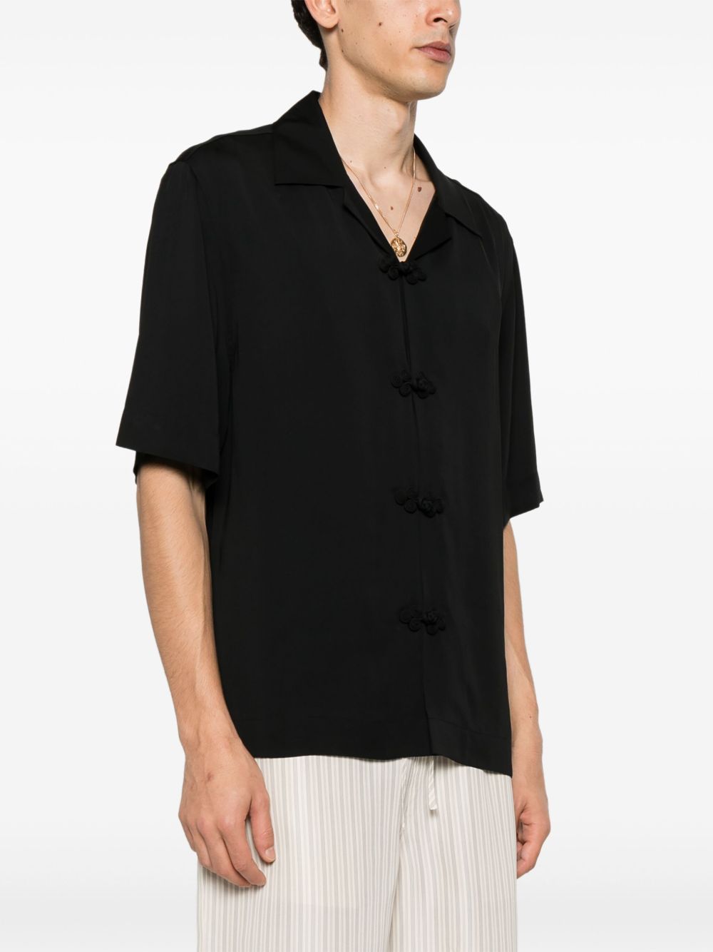 Camisa