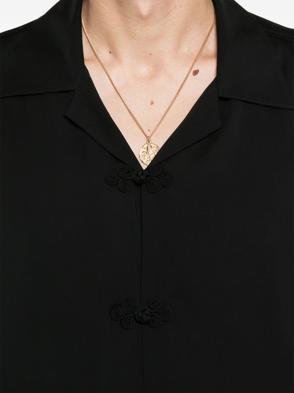 Camisa